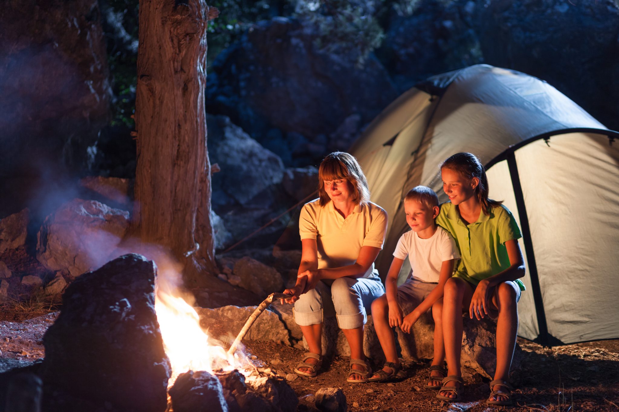 Family at the camping at night - Tell Your Story with Evalogue.Life