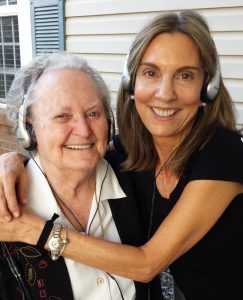 Marie Coz with one of her favorite Music and Memory patients at Mary, Queen of Angels Assisted Living Community in Nashville, Tennessee.