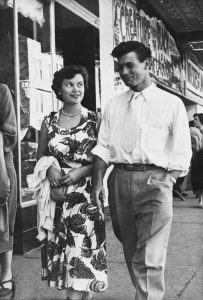 Jim and Norma Kier while they were dating in the 1950s. This photo of them dressed nicely is taken while walking down the street of Edmonton Canada in the 1950s. Jim Kier was a wonderful business storyteller.