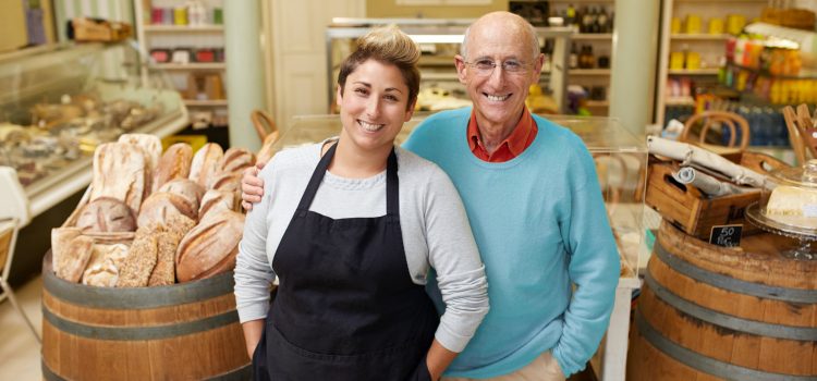 A father and daugther standing together in their deli. This page is an overview of the Evalogue.Life storytelling services.