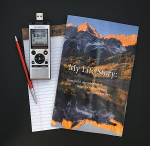 An oral history kit: digital recorder, My Life Story booklet of questions and pen