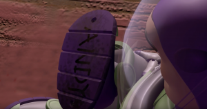 Buzz looks at his boot that is labeled "Andy" and it snaps him out of his darkest hour.