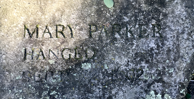 Stone marker at the memorial for victims of the witch trials of 1692 in Salem, Massachusetts. It reads Mary Parker, Hanged Sept 22, 1692"